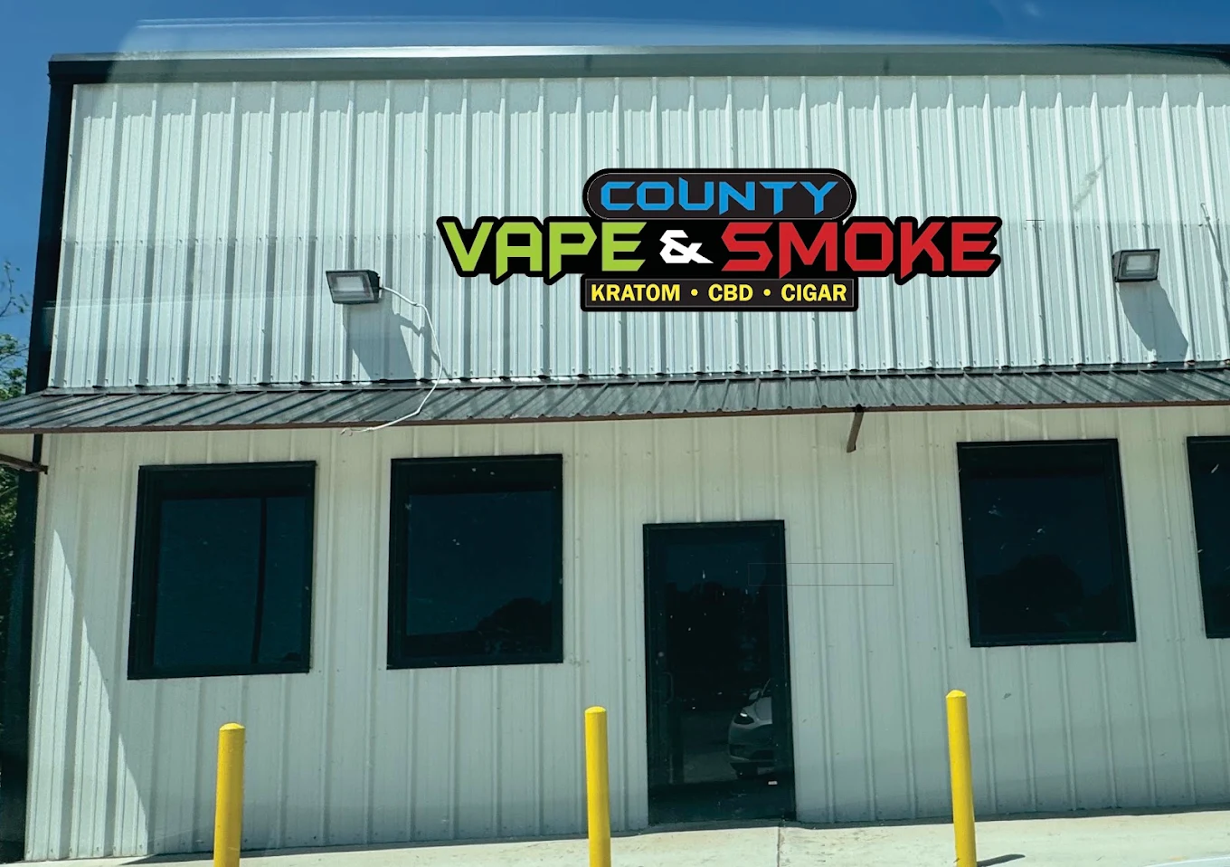County Vape & Smoke store sign — Kratom, CBD, Cigar